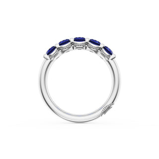 Oval Cut Blue Sapphire Eternity Band in 18kt White Gold