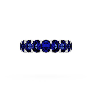 Oval Cut Blue Sapphire Eternity Band in 18kt White Gold