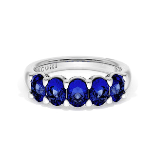 Oval Cut Blue Sapphire Eternity Band in Platinum