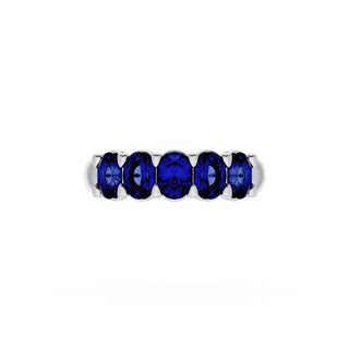 Oval Cut Blue Sapphire Eternity Band in Platinum