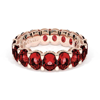 Oval Cut Ruby Eternity Band in 18kt Rose Gold