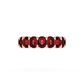 Oval Cut Ruby Eternity Band in 18kt Rose Gold