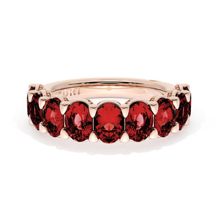 Oval Cut Ruby Eternity Band in 18kt Rose Gold