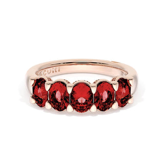 Oval Cut Ruby Eternity Band in 18kt Rose Gold