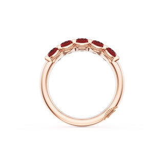 Oval Cut Ruby Eternity Band in 18kt Rose Gold