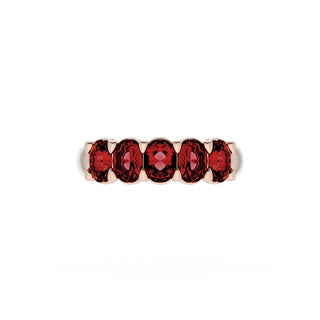 Oval Cut Ruby Eternity Band in 18kt Rose Gold
