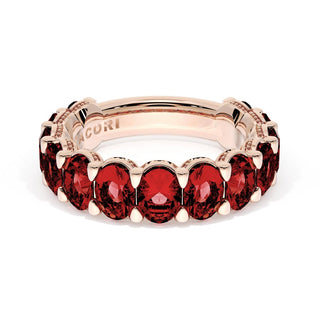 Oval Cut Ruby Eternity Band in 18kt Rose Gold