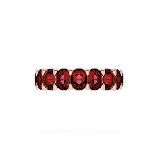 Oval Cut Ruby Eternity Band in 14kt Rose Gold