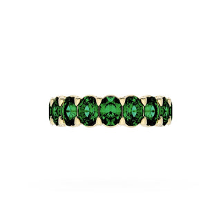 Oval Cut Emerald Eternity Band in 18kt Yellow Gold