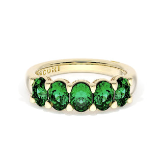 Oval Cut Emerald Eternity Band in 18kt Yellow Gold