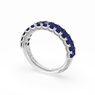 Emerald Cut Blue Sapphire Eternity Band in 18kt White Gold