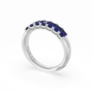 Emerald Cut Blue Sapphire Eternity Band in 18kt White Gold