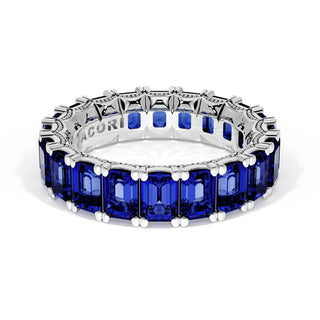 Emerald Cut Blue Sapphire Eternity Band in 18kt White Gold