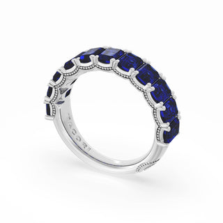 Emerald Cut Blue Sapphire Eternity Band in 18kt White Gold