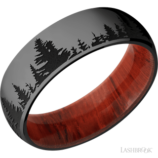 7 mm wide/Domed/Zirconium band with a laser carved Trees pattern also featuring a Padauk sleeve.