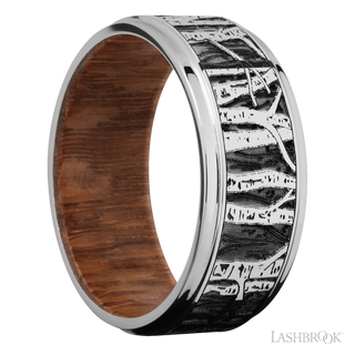 9 mm wide/Flat Grooved Edges/Cobalt Chrome band with a laser carved Aspen pattern also featuring a Leopard Wood sleeve.