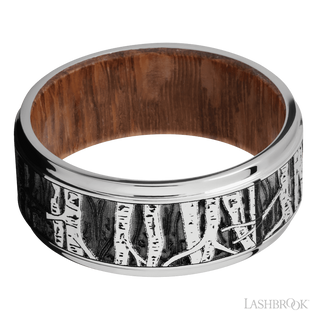 9 mm wide/Flat Grooved Edges/Cobalt Chrome band with a laser carved Aspen pattern also featuring a Leopard Wood sleeve.