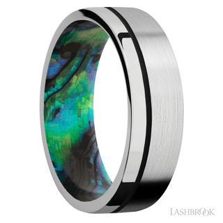 7 mm wide/Flat/14K White Gold band with one 0.5 mm Off Center inlay of Black also featuring a Abalone sleeve.