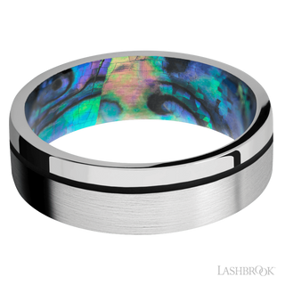 7 mm wide/Flat/14K White Gold band with one 0.5 mm Off Center inlay of Black also featuring a Abalone sleeve.