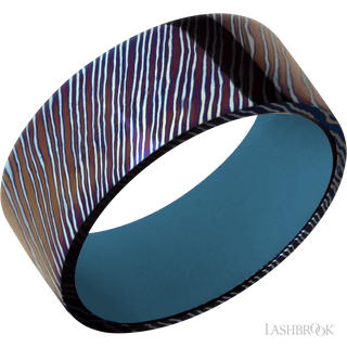 9 mm wide Flat Titanium Damascus band featuring a Royal Blue sleeve.