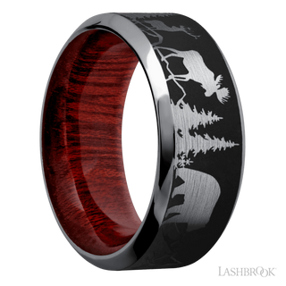 9 mm wide/High Bevel/Tantalum band with a laser carved Bear Moose Deer Mountain pattern also featuring a Blood Wood sleeve.